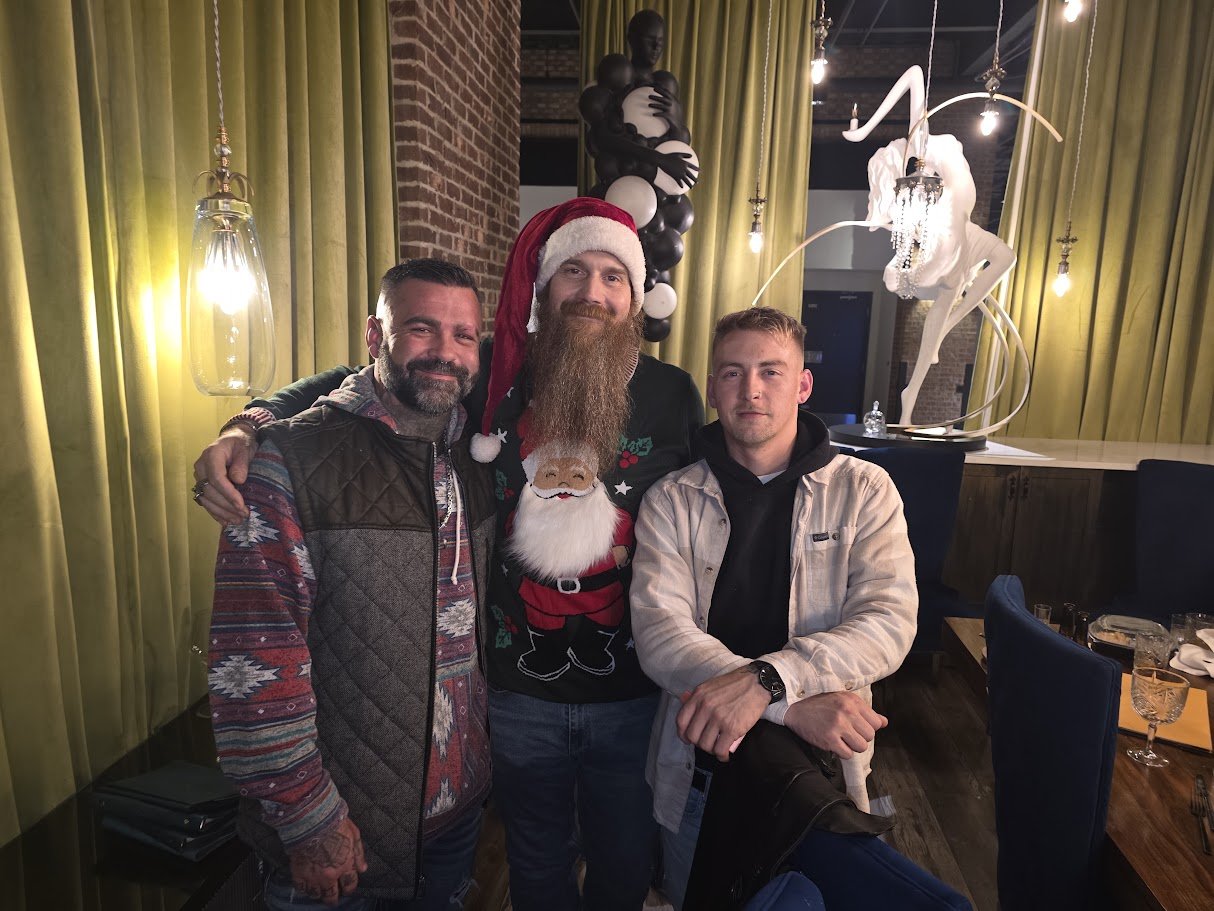 Friends posing together at a holiday gathering