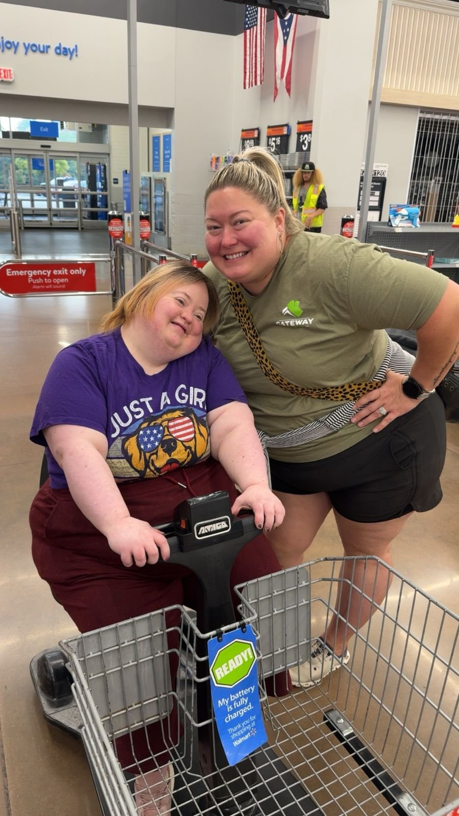 Two women smiling together while shopping