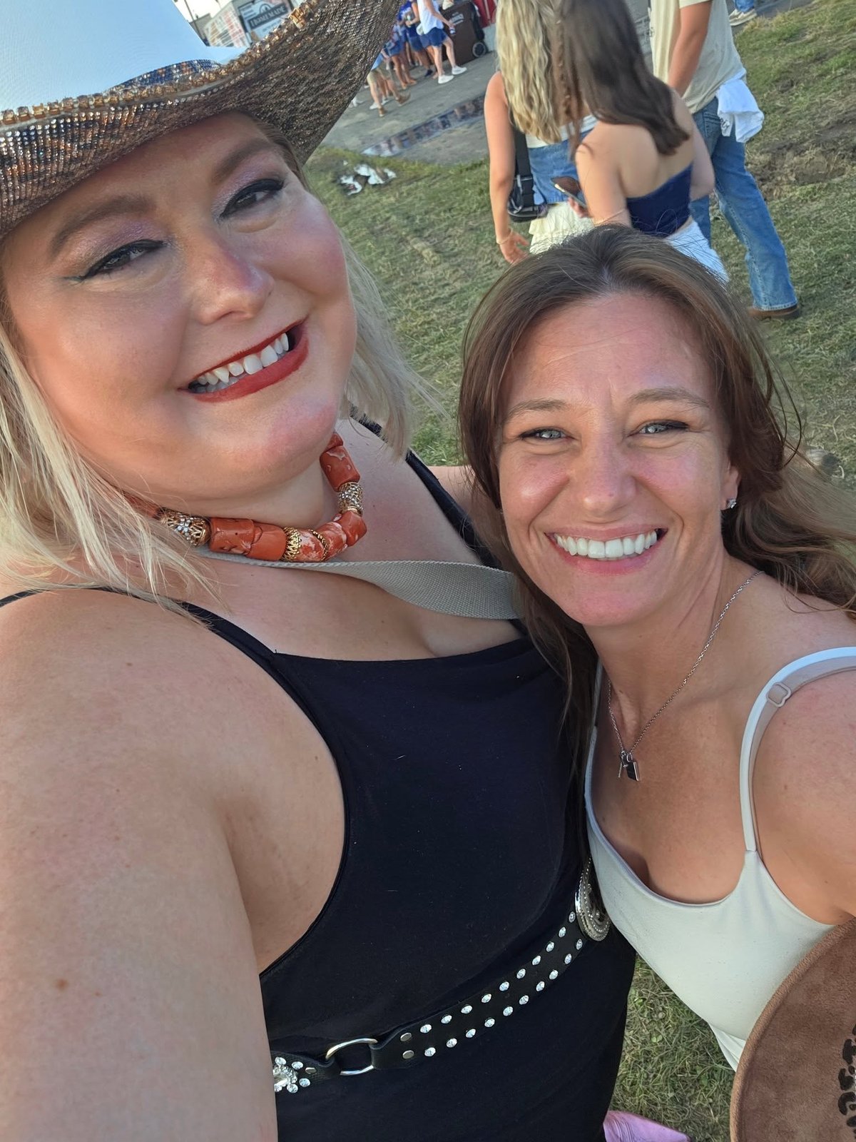 Two women smiling together outdoors