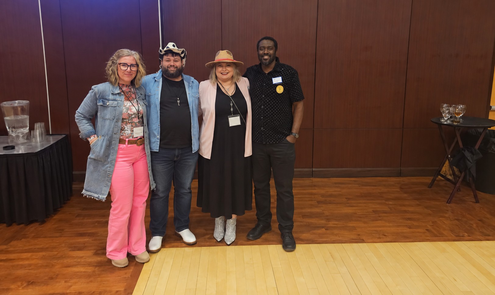 Four members of the Gateway team together at an event