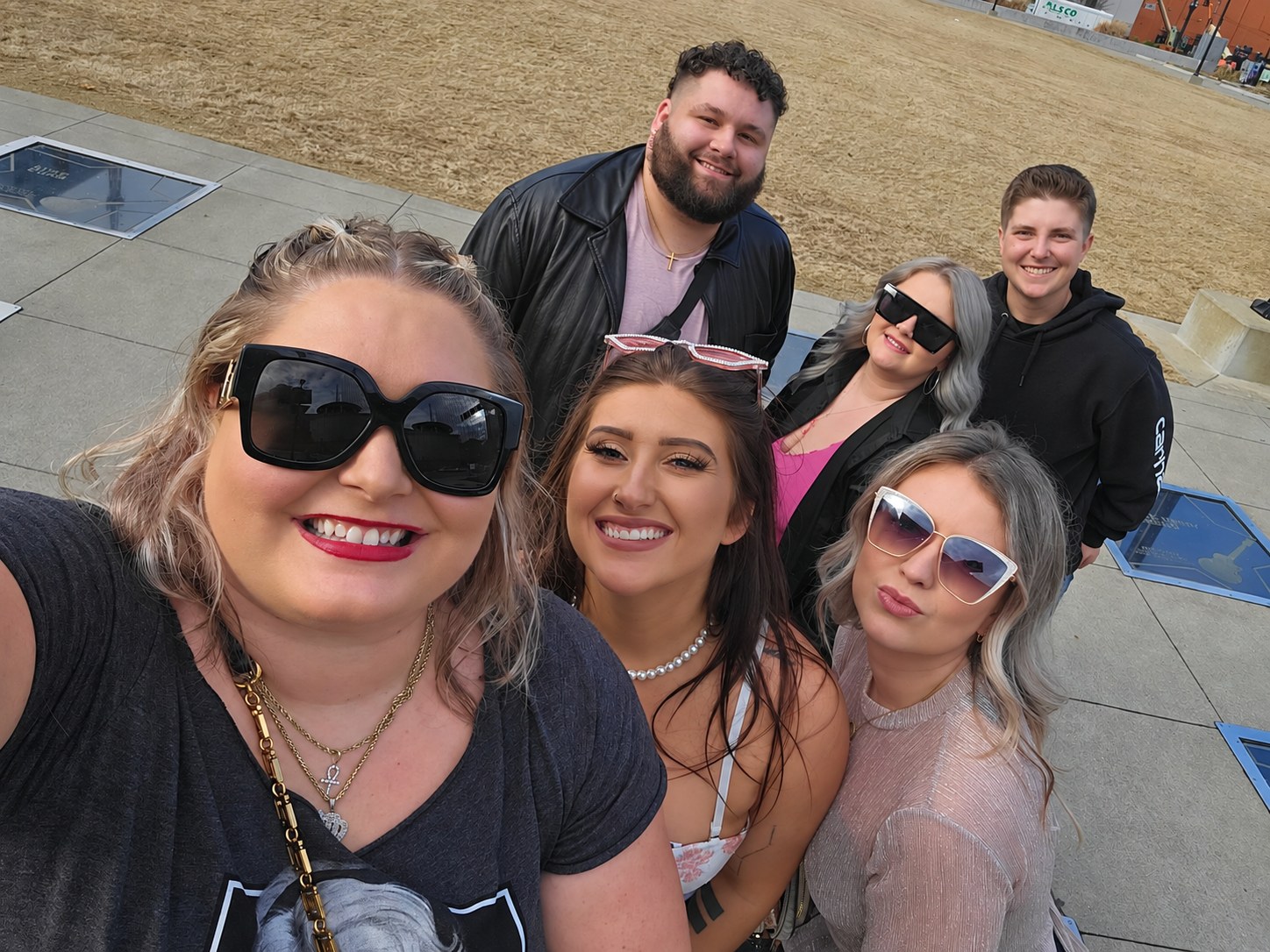 Six members of the Gateway team smiling together outdoors